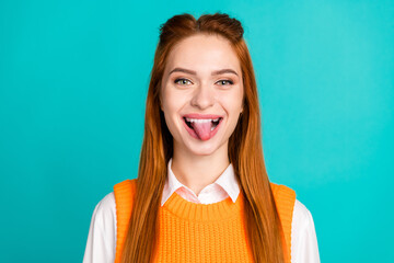 Photo portrait of pretty young girl cheerful tongue out wear trendy orange knitwear outfit isolated...