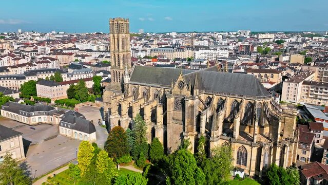 Aerial view of Roman Catholic church located in Limoges city, medieval timber-frame houses and buildings. Panoramic view of Gothic Cathédrale Saint-Étienne de Limoges and the city's medieval enamel.