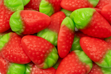 Jelly strawberry candies isolated on a white background. Top view. Delicious gelatin candies.