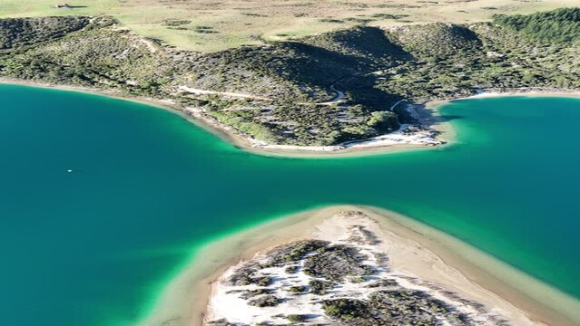 Beautiful sandy lakes with tranquil blue water, the Kai Iwi lakes, Northland, New Zealand