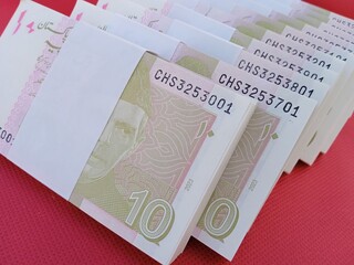 Bundle of Pakistani Currency. 10 Rupees note Pakistani, Pakistani currency note PKR 10 rupees. Heap of Pakistani currency bundle