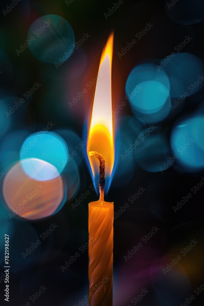 Aufkleber a glowing candle with a blurred backdrop, ideal for adding warmth and ambiance to various projects