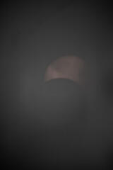 This is the solar eclipse seen from Pennsylvania on April 8th, 2024. This is only partial and not full. The beautiful fireball is being covered by the moon. The oranges and yellows are so bright.