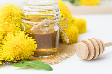 Syrup, dandelion honey, composition with fresh flowers - obrazy, fototapety, plakaty