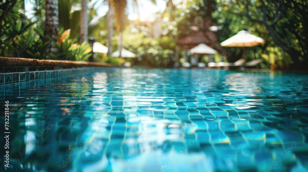 Poster a tranquil swimming pool scene with colorful umbrellas in the background. ideal for travel and leisu