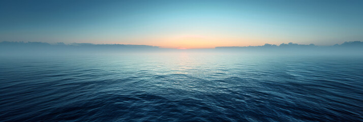 Serene Ocean Sunrise Panorama with Misty Horizon