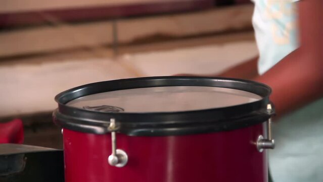Hands of A Young Boy Playing A Snare Drum and Cowbell at his Home in Argentina. Close Up. 4K Resolution.