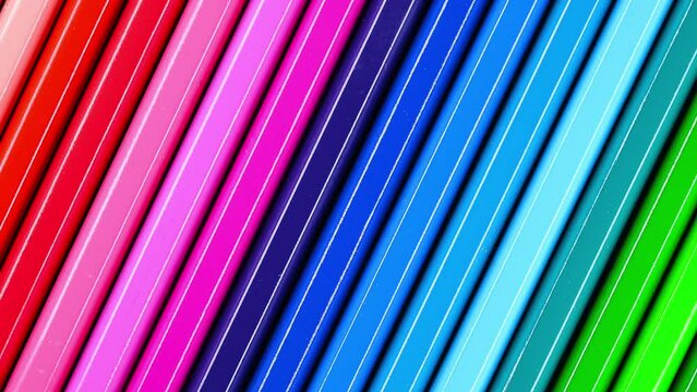 Multicolored Pencils background. Video of Color pencils close up. Video background of stationery. Camera scaling on colorful pencils