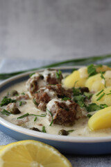 Classic Comfort: Homemade Königsberger Meatballs with Caper Sauce and Boiled Potatoes