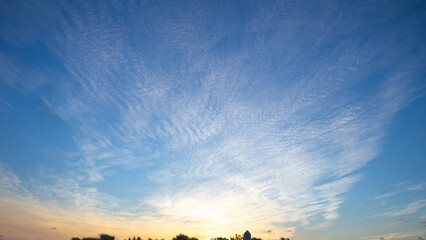  sunset sky with thin clouds, blue, orange