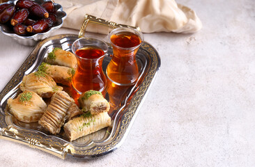 Turkish sweets baklava with nuts on a metal tray