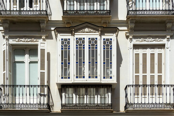 Malaga Enclosed Balcony and Facade of a Building.