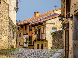 Empty street of Santillana del Mar village during low tourist season