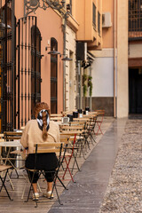 Woman relaxing on coffee shop