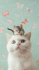 White cat with a mouse on its head. Wallpaper with butterfly pattern. Minimalistic studio photo on a light blue background.