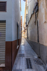 A very narrow street of Malaga city