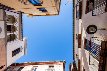A very narrow street intersection of Malaga city
