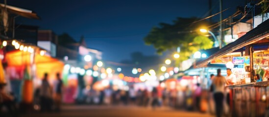 Obraz premium Night street scene with blurred figures