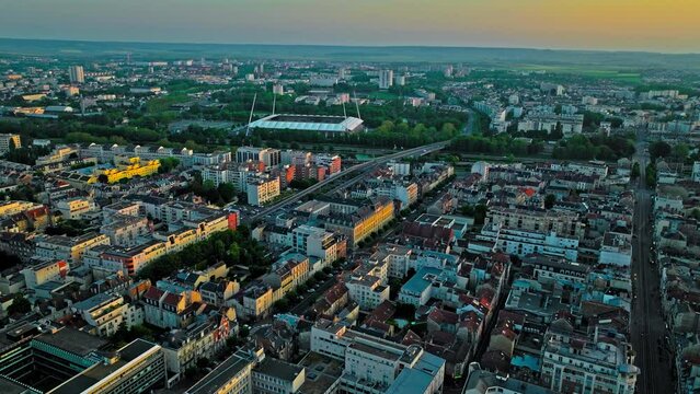Aerial view of Reims Stadium in France. Stade Auguste Delaune, sunset over French buildings in Reims.