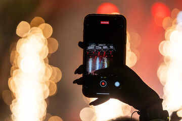 Fan uses cellphone to record concert