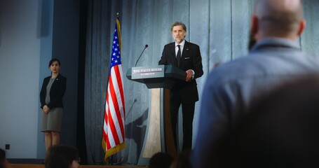 Presidential of USA candidate makes an announcement, delivers campaign speech, answers questions and gives interview. American republican politician performs at meeting with journalists. Election day. - obrazy, fototapety, plakaty