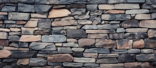 Fototapeta premium Stone wall texture with small patch of soil