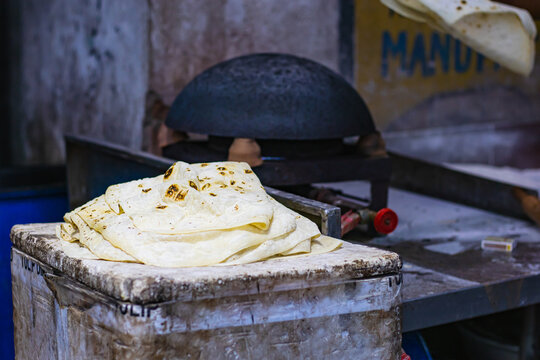Rumali roti is a type of flatbread made of flour. It is thin and large in size. 
