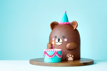 Cute teddy bear birthday cake with mini birthday cake