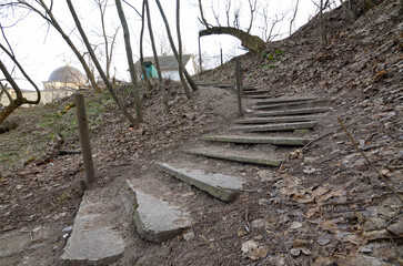 Steps to the old closed Tartar cemetery, dome of Ar Rahma mosque on a background. Tatarka, Kyiv,...