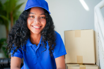 Efficient young courier with engaging smile delivers parcels, representing prompt service and...