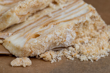 multi-layered cake made of buttercream and thin wheat cakes