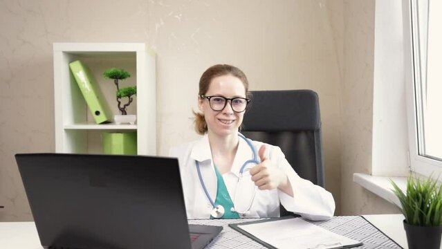 Doctor thumbs up, healthcare provider giving the okay, professional support.