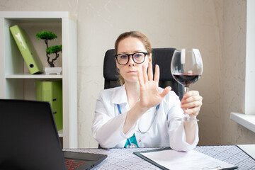 refuse alcohol, stop liquor, doctor shows a sign of rejection of wine with her hand