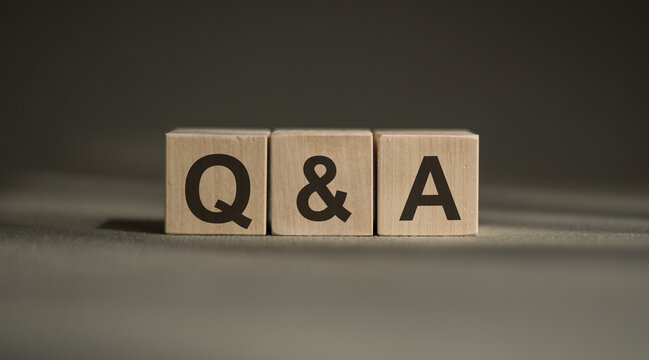 A block with the word Q and A written on it, symbolizing a question and answer business concept.