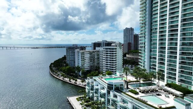 City on water luxury real estate rooftop swimming pool condo miami Brickell 4k Drone Video 