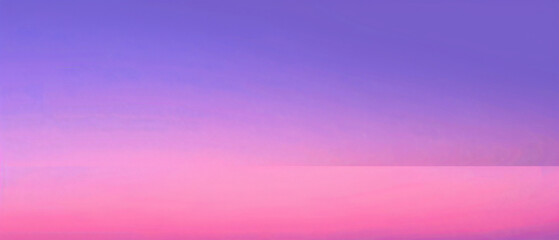 A lovely sky transitioning from soft pink at sunrise to deep purple at sunset.