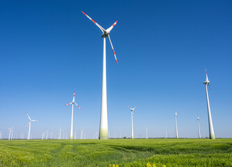 Modern wind turbines seen close to Berlin in Germany - 782269499