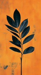 Dark leaves against orange textured background