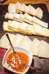 Cheese and jam plate for aperitif or appetizers.