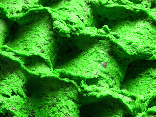Frozen Cannabis flavour gelato - full frame detail of sorbet. Close up of a green surface texture...