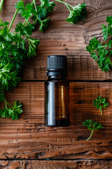 patchouli essential oil in a bottle. selective focus. - obrazy, fototapety, plakaty