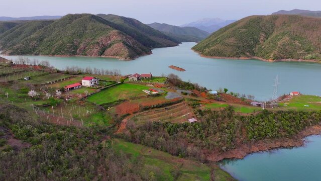 Aerial view of houses by a lake in Mirdita district, northern Albania