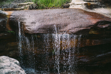 Rock pool swimming hole Australia forest rain water swim summer