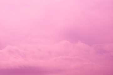 Purple background. Clouds in the sky. An abstract image.