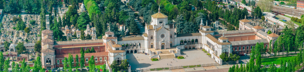 Fototapeta na wymiar Aerial view of Monumental Cemetery, Milan, Lombardy. Entrance to the cemetery, architecture. Famedio, a cemetery of high artistic value for sculptures, tombs, funerary edemas