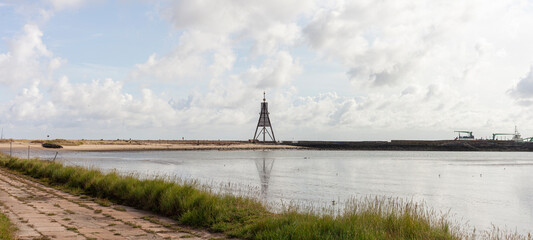 Panoramic photo of the Lighthouse in Cuxhaven, Germany, 30 m high on the seashore, used as a...