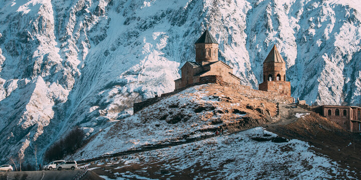 Stepantsminda, Gergeti, Georgia. Famous Gergeti Trinity Tsminda Sameba Church In Early Winter.