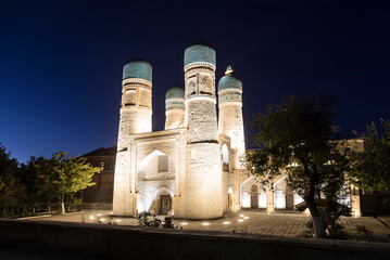 Ancient Chor-Minor madrasah in Bukhara at night, Uzbekistan