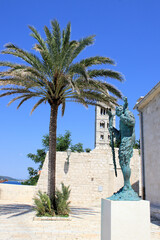 Fototapeta premium bronze statue in the old town of Rab, island Rab, Croatia