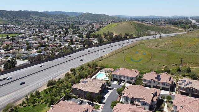 Drone lowers towards Happy Face Hill in Simi Valley, CA